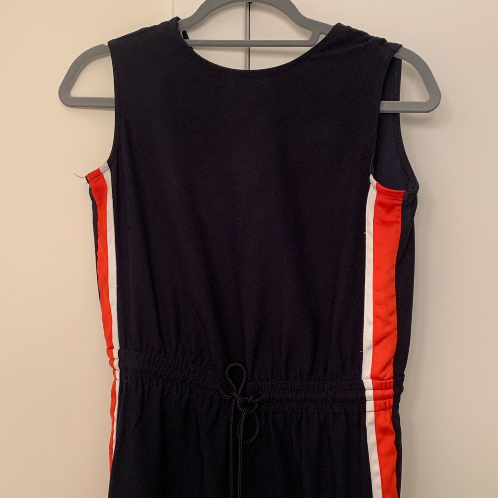 Navy Jumpsuit with red and white side stripes